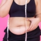 Woman trying to beat the bloat.
