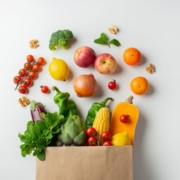 bag of vegetables and fruit, apples, tomatoes, sweetcorn, broccoli