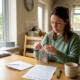 Woman collecting hair sample at home