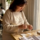 Woman assembling at-home test kit on table