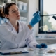Lab technician preparing allergen samples in clinic