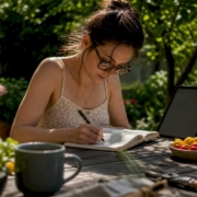 Woman preparing elimination diet checklist in kitchen