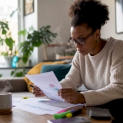 Woman studying UK food intolerance statistics at home