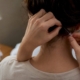Hands collecting hair sample at home