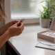 Hands collecting hair sample for at-home test