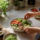 Hands preparing Mediterranean diet food