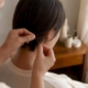 Hands collecting hair sample for eczema test