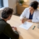 Clinician and patient reviewing test report