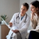 Patient discussing intolerance test results with clinician