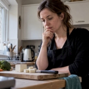 Woman considering soy food at home